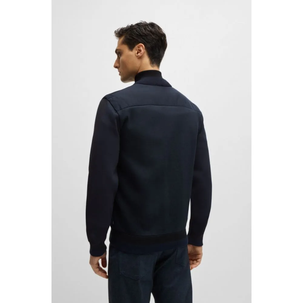 Mixed-material zip-up jacket with double-monogram badge