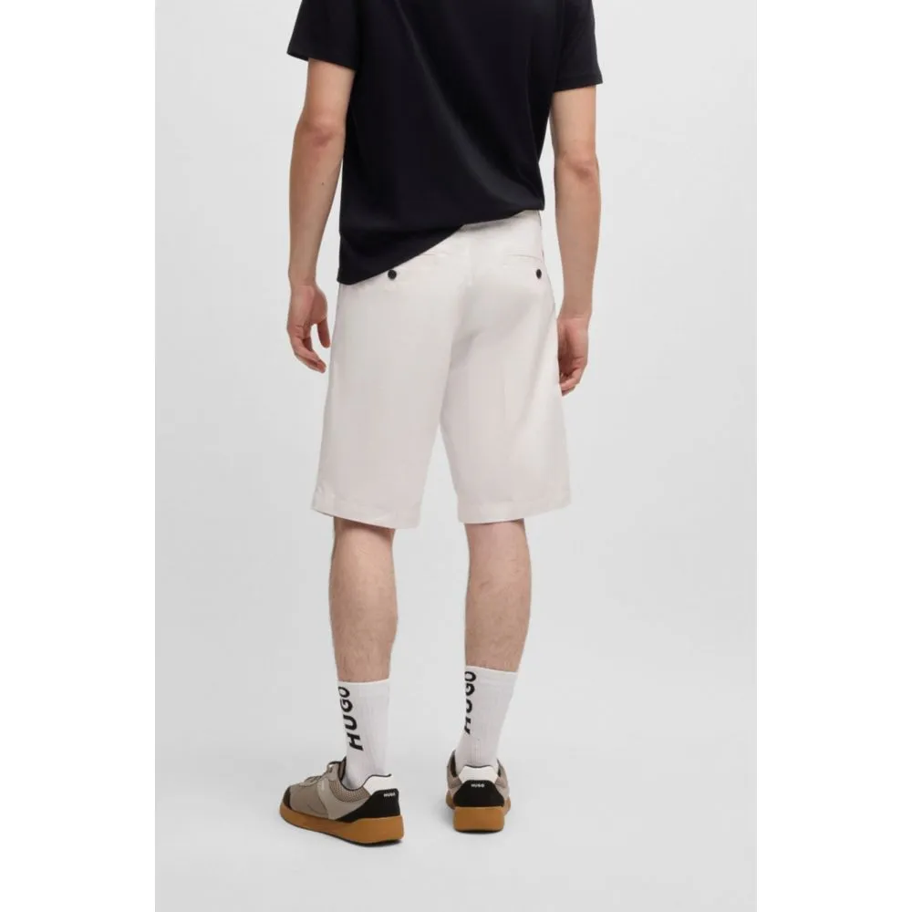 Regular-fit shorts with slim leg and buttoned pockets