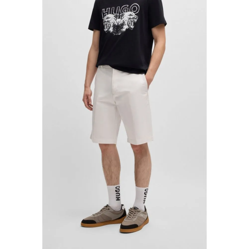 Regular-fit shorts with slim leg and buttoned pockets